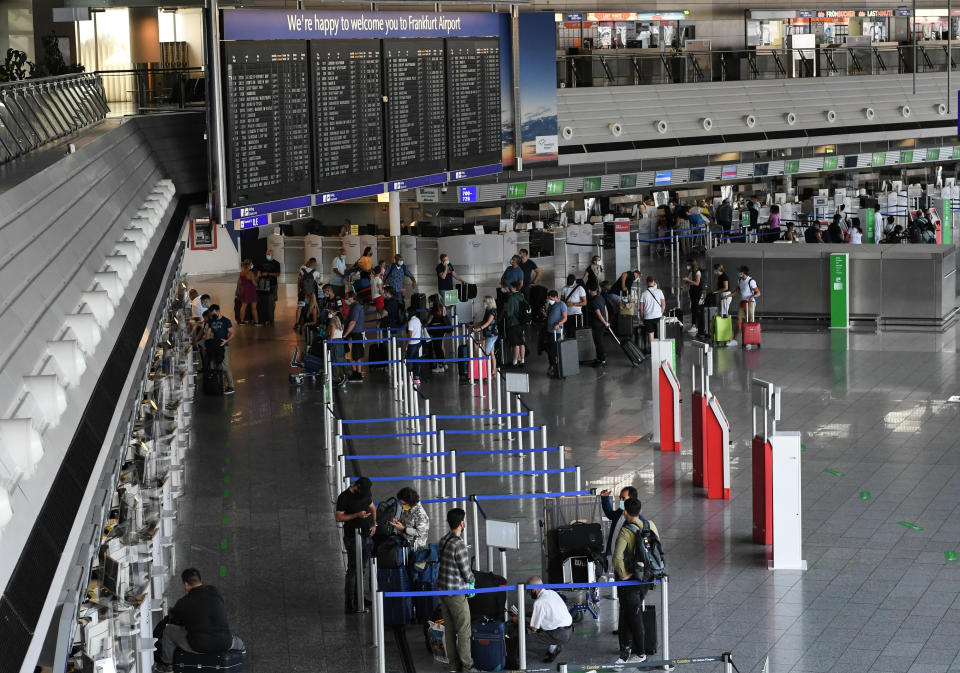 Passengers at Frankfurt airport in Germany, on 19 Augusts. Photo: Lu Yang/Getty