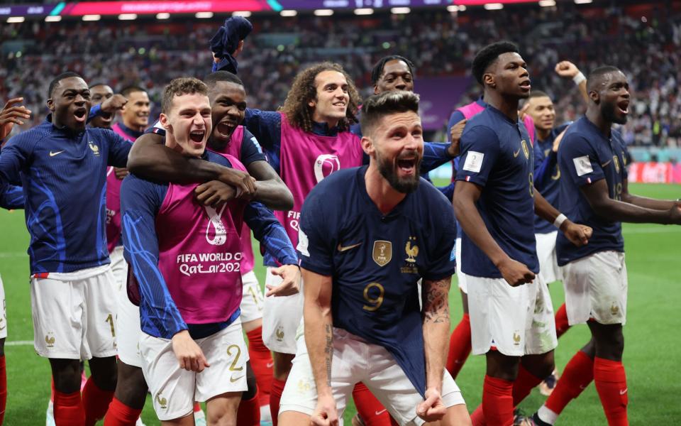 Olivier Giroud (C) and players of France react after the FIFA World Cup 2022 quarter final soccer match between England and France - SHUTTERSTOCK