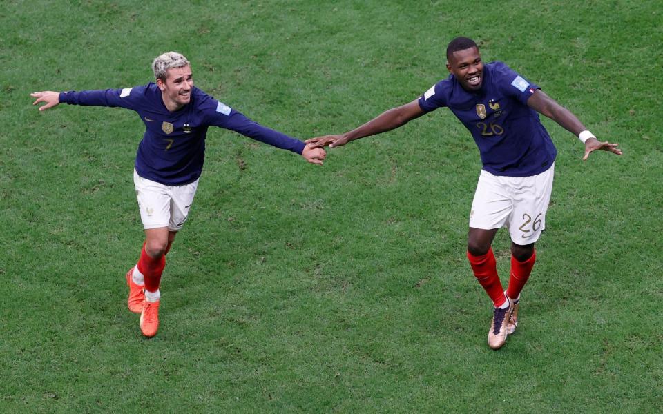 Antoine Griezmann (L) and Marcus Thuram of France celebrate after the FIFA World Cup 2022 quarter final - SHUTTERSTOCK