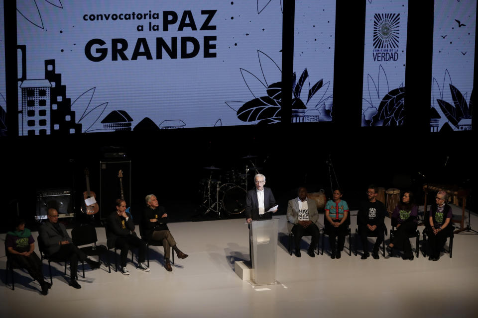 Truth Commission President Francisco de Roux speaks during a ceremony to release the commission's final report regarding the country's internal conflict, in Bogota, Colombia, Tuesday, June 28, 2022. A product of the 2016 peace deal between the government and the Revolutionary Armed Forces of Colombia, FARC, the commission was tasked to investigate human rights violations committed by all actors between 1958 and 2016. (AP Photo/Ivan Valencia)