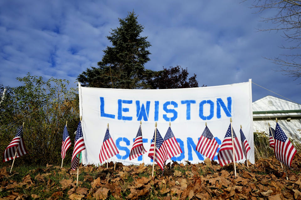 FILE - A make-shift memorial lines Main Street, Nov. 3, 2023, in Lewiston, Maine. The Maine Legislature has approved sweeping gun safety legislation early Thursday, April 18, 2024, nearly six months after the deadliest shooting in state history. (AP Photo/Matt York, File)