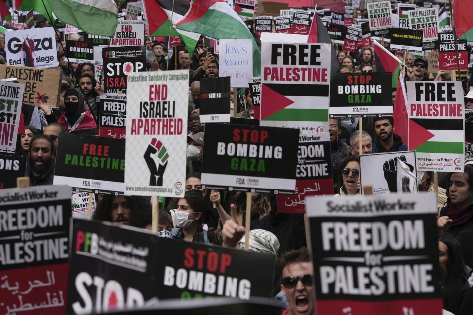 FILE - Protesters attend a pro Palestinian demonstration in London, on Oct. 14, 2023. Antisemitism is spiking across Europe after Hamas' Oct. 7 massacre and Israel's bombardment of Gaza, worrying Jews from London to Geneva and Berlin. (AP Photo/Kin Cheung, File)