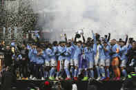 New York City FC players celebrate their penalty kick shootout win over the Portland Timbers in the MLS Cup soccer game, Saturday, Dec. 11, 2021, in Portland, Ore. (AP Photo/Amanda Loman)