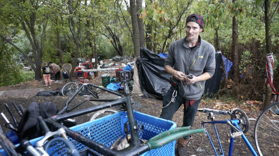 Wolf Boone, a resident of a homeless camp near Los Osos Valley Road off the Bob Jones Trail, prepares to move his possessions before San Luis Obispo police clear the camp out on Monday, Sept. 19, 2022.