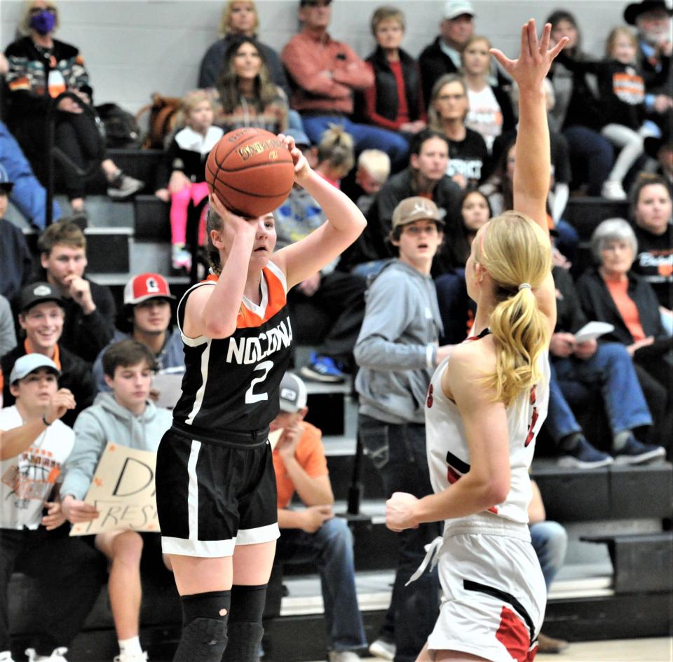 Nocona's Skyler Smith shoots a three-pointer against Eastland on Monday, February 14, 2022 during the Region !-3A Bi-District playoffs in Springtown.