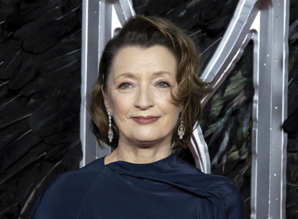 FILE - In this Oct. 9, 2019 file photo, actress Lesley Manville appears at the premiere of the film "Maleficent Mistress of Evil" in London. The Queen's New Year honors list was announced Wednesday, Dec. 30, 2020. Actress Lesley Manville, an Oscar nominee for “Phantom Thread,” was named a Commander of the Order of the British Empire, or CBE. Actor Toby Jones, whose credits include Dobby in the “Harry Potter” movies, was made an Officer of the Order of the British Empire or OBE, as was writer Jed Mercurio, creator of gripping TV detective series “Line of Duty.” (Photo by Grant Pollard/Invision/AP, File)