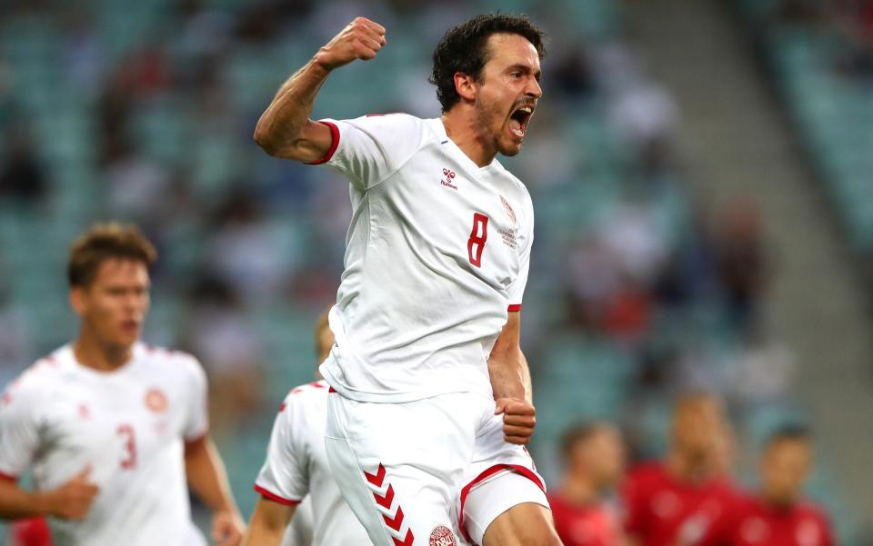 Denmark midfielder Thomas Delaney punches the air after scoring against the Czech Republic - GETTY IMAGES