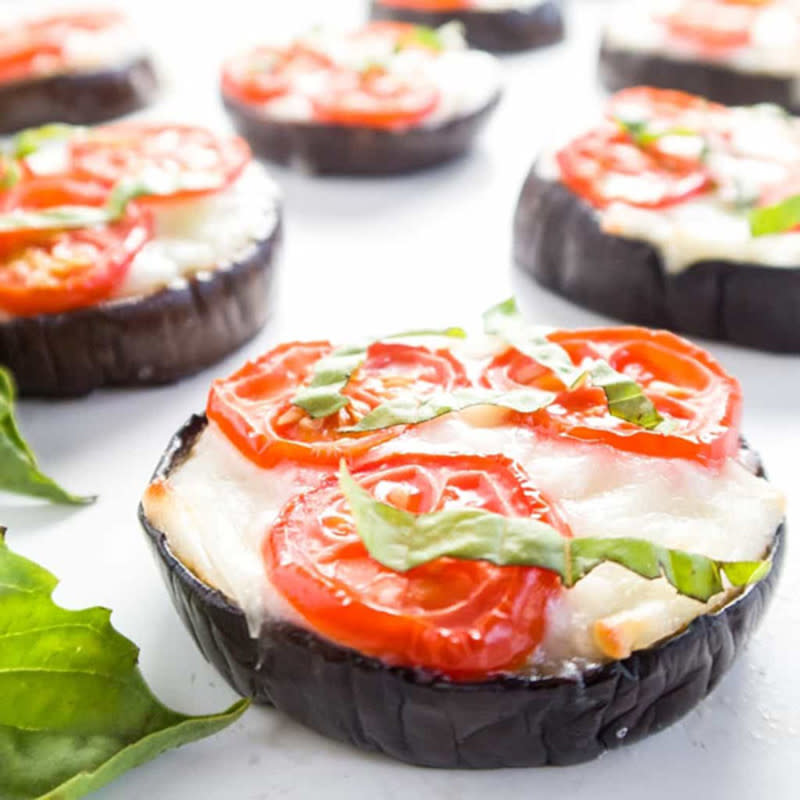 <p>Wholesome Yum</p><p>These low-carb pizza can be customized with your favorite toppings!</p><p><strong>Get the recipe: <a href="https://www.wholesomeyum.com/recipes/eggplant-margherita-pizza/" rel="nofollow noopener" target="_blank" data-ylk="slk:Low-Carb Eggplant Pizzas;elm:context_link;itc:0;sec:content-canvas" class="link ">Low-Carb Eggplant Pizzas</a></strong></p>