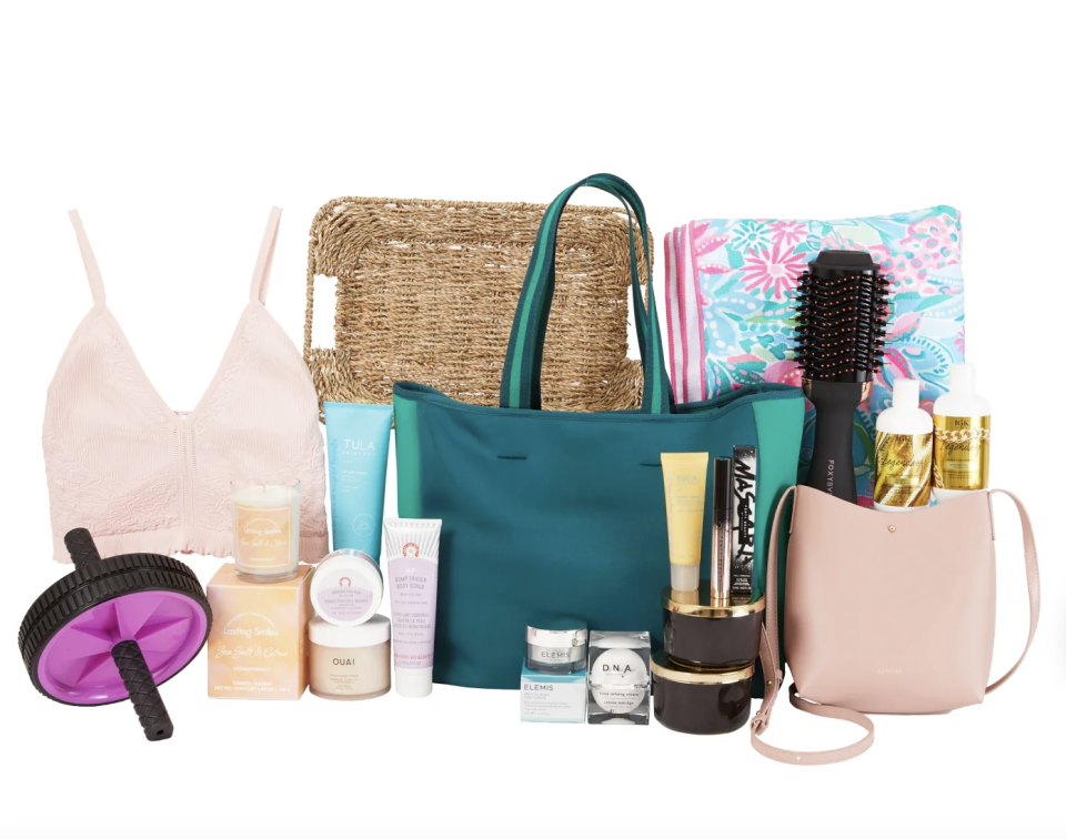 FabFitFun subscription box with sports bra, blue bag, hair dryer, basket and beauty products (Photo via FabFitFun)