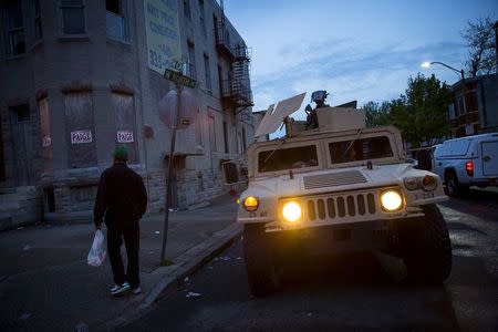 The National guard is pictured at North Ave and Pennsylvania Ave in Baltimore, Maryland April 30, 2015. REUTERS/Eric Thayer