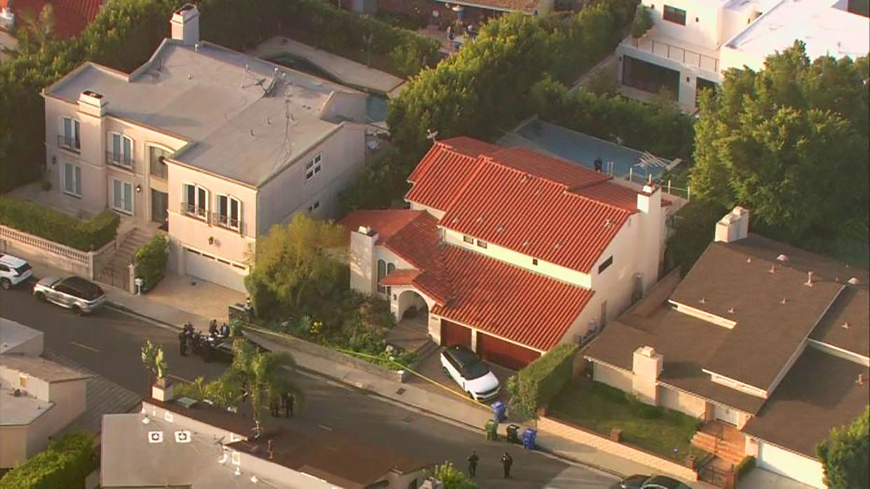 FILE - In this Feb. 19, 2020, aerial image taken from video provided by Fox11 News KTTV-TV shows the Hollywood Hills home, center, where New York rapper Pop Smoke, 20, was shot and killed early Feb. 19, in Los Angeles. One of four men charged in the killing of the rapper during a robbery at a Hollywood Hills mansion has pleaded guilty to voluntary manslaughter. (Fox11 News KTTV-TV via AP, File)