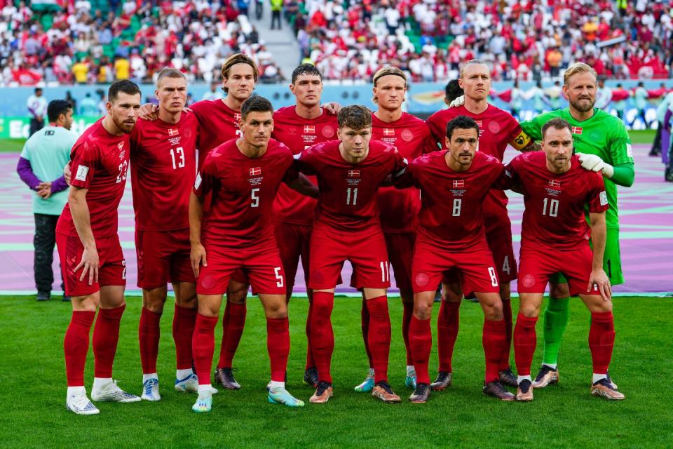 Denmark players pose for photographers prior the World Cup group D football match between Denmark and Tunisia, at the Education City Stadium in Al Rayyan, Qatar, Tuesday, Nov. 22, 2022. (AP Photo/Manu Fernandez)