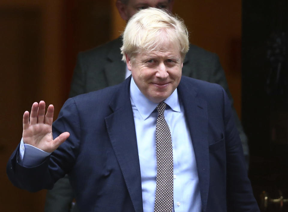 Britain's Prime Minister Boris Johnson leaves 10 Downing Street, on his way to parliament in London, Thursday October 24, 2019. Johnson has announced Thursday that he wants a General Election. (Hollie Adams/PA via AP)