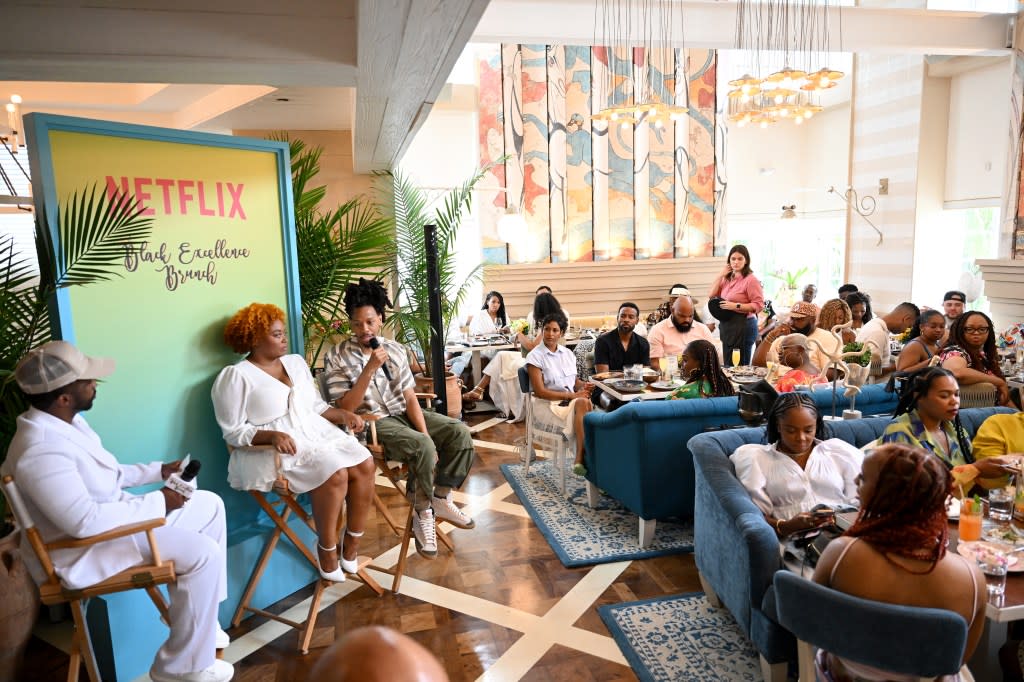 MIAMI BEACH, FLORIDA - JUNE 16: (L-R) Trell Thomas, Numa Perrier, and Juel Taylor speak during the Black Excellence Brunch at Byblos Miami on June 16, 2023 in Miami Beach, Florida. (Photo by Jason Koerner/Getty Images for Netflix)