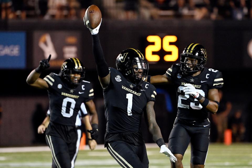 Vanderbilt's Elijah McAllister (1) celebrates after recovering a fumble in the second half of an NCAA college football game against Elon, Saturday, Sept. 3, 2022, in Nashville, Tenn. (AP Photo/Mark Zaleski)