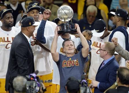 May 26, 2015; Cleveland, OH, USA; Cleveland Cavaliers owner Dan Gilbert celebrates with the Eastern Conference trophy after beating the Atlanta Hawks in game four of the Eastern Conference Finals of the NBA Playoffs at Quicken Loans Arena. Mandatory Credit: David Richard-USA TODAY Sports