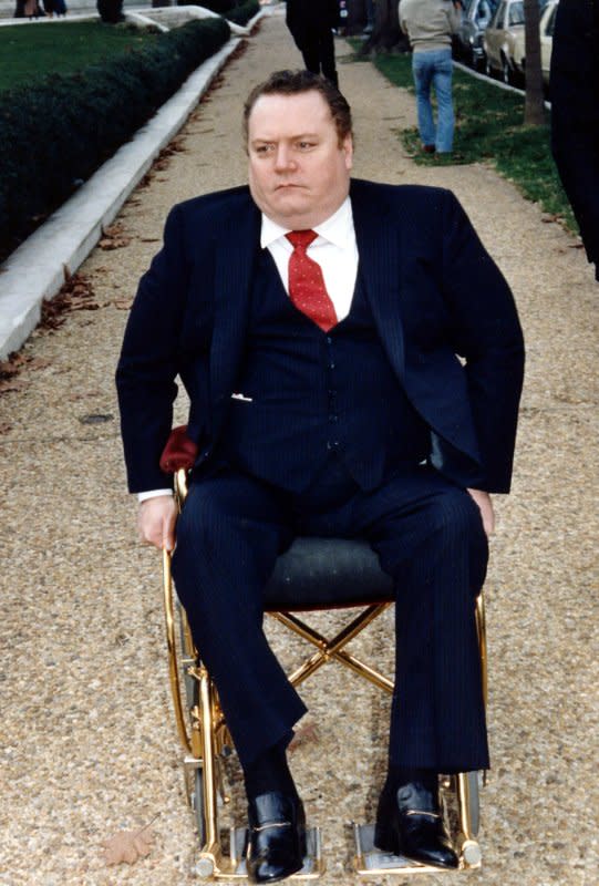 Hustler Magazine publisher Larry Flynt arrives at the Supreme Court on December 2, 1987. On February 24, 1988, the U.S. Supreme Court overturned a $200,000 settlement awarded the Rev. Jerry Falwell over a parody of him in Hustler magazine. File Photo by Leighton Mark/UPI