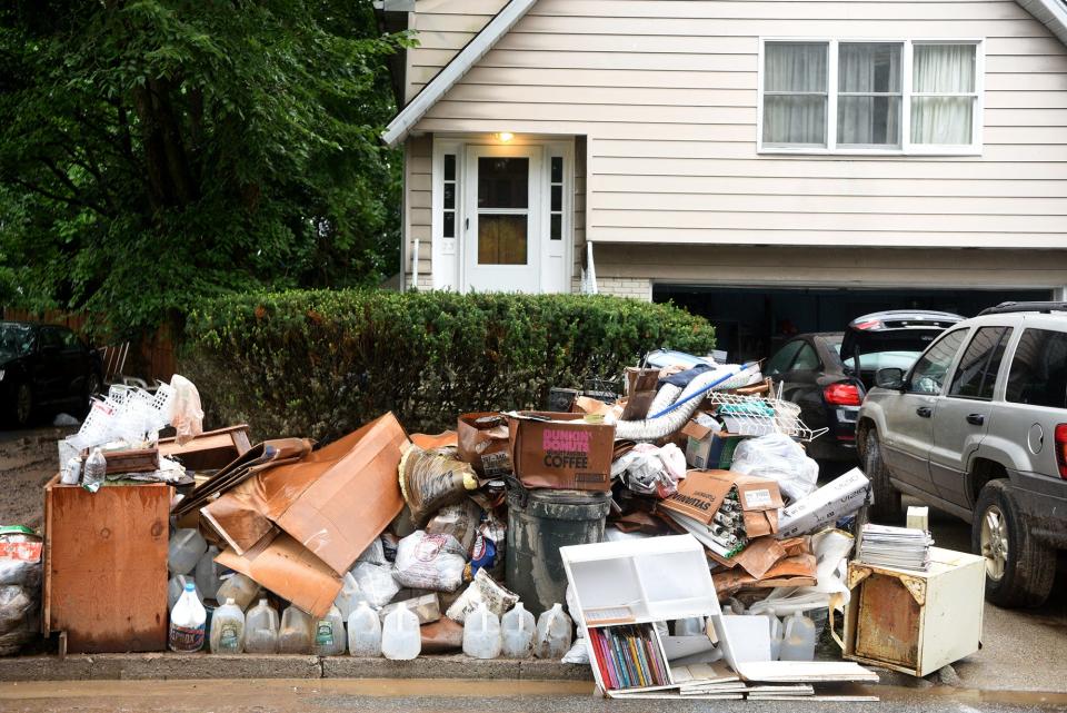 Items ruined in the flood removed from a home on Cedar St. in Little Falls sit on the street on Monday, August 13, 2018. Flooding in the neighborhood near the Peckman River on Saturday is being called the worst since Hurricane Floyd.
