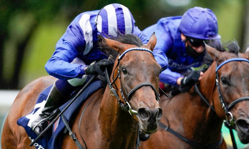 Jim Crowley rides Nazeef (blue/white cap) to victory in the Tattersalls Falmouth Stakes at Newmarket.