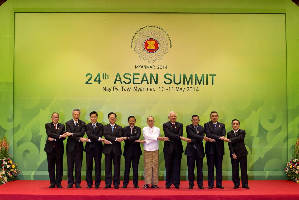 CORRECTS THE ID OF VIETNAMESE LEADER - Leaders of the Association of Southeast Asian Nations pose for a photograph during the 24th ASEAN leaders Summit in Naypyitaw, Myanmar, Sunday, May 11 2014. Leaders from left are, Philippine President Benigno Aquino III, Singaporean Prime Minister Lee Hsien Loong, Thailand's Deputy Prime Minister Pongthep Thepkanjana, Vietnamese Prime Minister Nguyen Tan Dung, Sultan of Brunei Hassanal Bolkiah, Myanmar President Thein Sein, Malaysian Prime Minister Najib Razak, Cambodian Prime Minister Hun Sen, Indonesian President Susilo Bambang Yudhoyono, and Laotian Prime Minister Thongsing Thammavong. (AP Photo/Gemunu Amarasinghe)