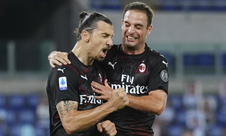 Milan’s Zlatan Ibrahimovic (left) celebrates with Giacomo Bonaventura after scoring their second goal against Lazio on Saturday.