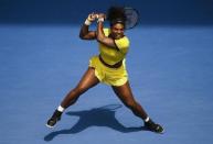 Serena Williams of the U.S. hits a shot during her quarter-final match against Russia's Maria Sharapova at the Australian Open tennis tournament at Melbourne Park, Australia, January 26, 2016. REUTERS/Jason Reed