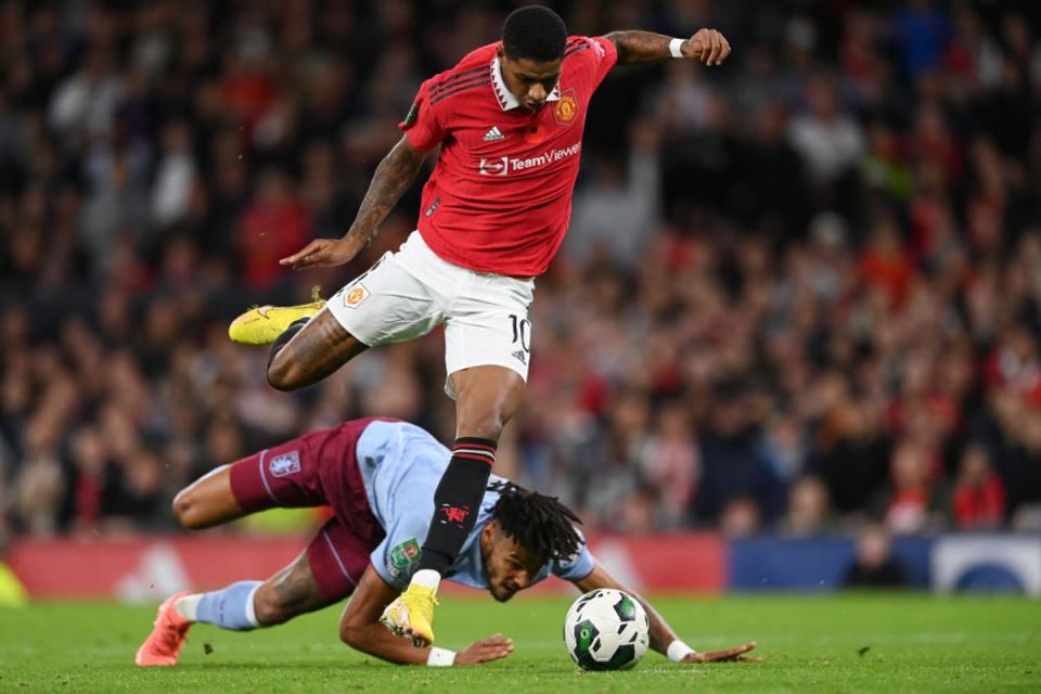 Rashford drives past Tyrone Mings for United’s second equaliser (Getty Images)