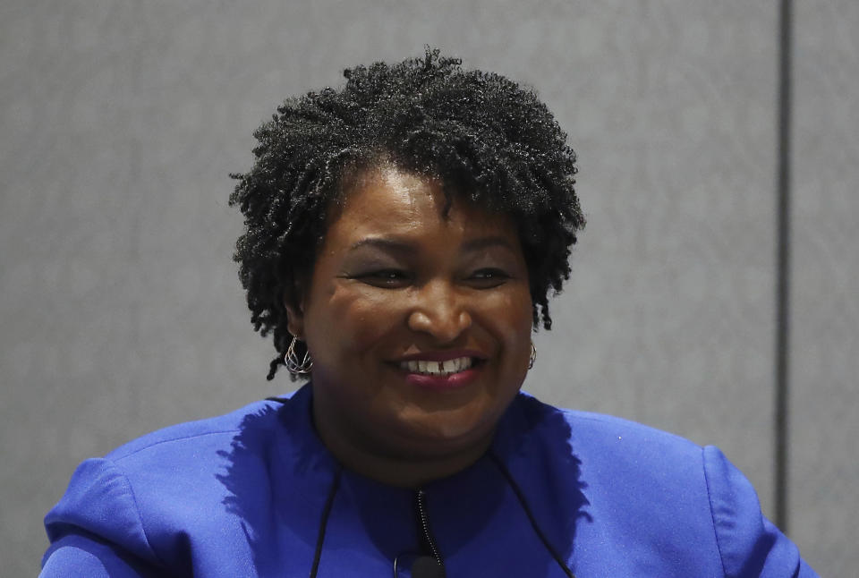 FILE - In this Aug. 3, 2018, file photo, Georgia gubernatorial candidate Stacey Abrams addresses attendees at the National Association of Black Journalists in Detroit. Abrams, the Democrat vying for the governorship of Georgia, is ratcheting up her assertion that Republican rival Brian Kemp is effectively suppressing minority and women voters, setting up a defining fault line in one of the nation's premier midterm election contests. (AP Photo/Carlos Osorio, File)