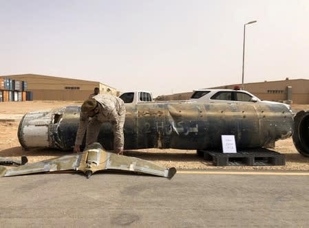 FILE PHOTO: A projectile and a drone launched at Saudi Arabia by Yemen's Houthis are displayed at a Saudi military base, Al-Kharj