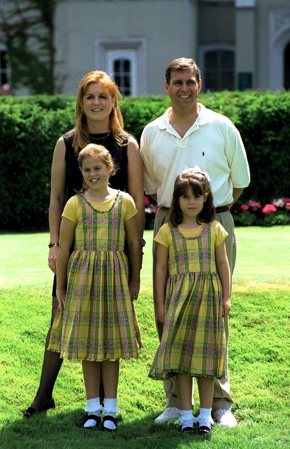 Princess Eugenie (bottom right) with her sister Beatrice and parents [Photo: Getty]