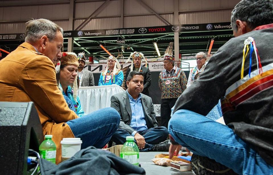  Left to right, seated, are Greg Rickford, Ontario Minister of Indigenous Affairs, Duke Peltier, trustee of the Robinson Huron Treaty Litigation Trust, and Gary Anandasangaree, Minister of Crown–Indigenous Relations.