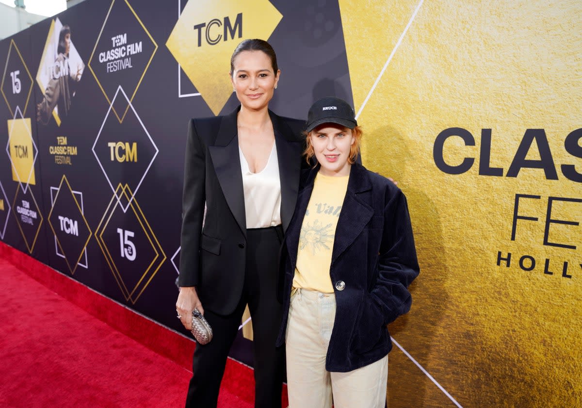 Emma Heming Willis (L) and Tallulah Willis (R) pictured on the carpet (Getty Images for TCM)