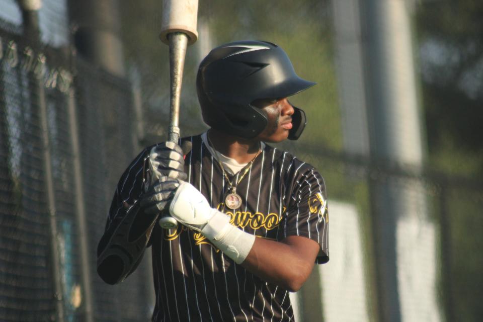 Englewood's Anthony Brown takes a swing in the on-deck circle during a Gateway Conference high school baseball final against Atlantic Coast on April 19, 2024. [Clayton Freeman/Florida Times-Union]