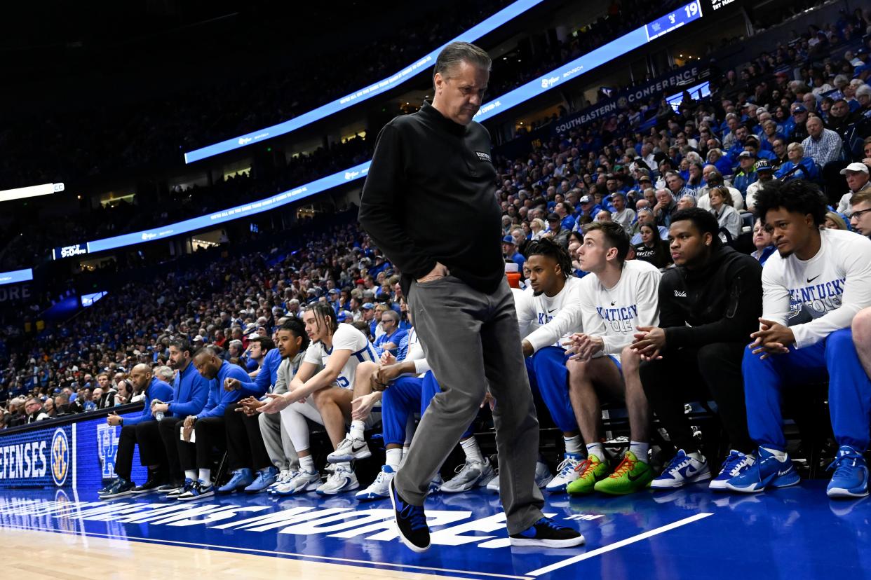 Kentucky coach John Calipari paces the sideline in front of his bench during a SEC Tournament quarterfinal game against Vanderbilt on March 10. His No. 3-seeded Wildcats were ousted by No. 14 Oakland 80-76 on Thursday in the first round of the NCAA Tournament.