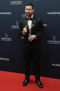 Argentine soccer player Lionel Messi poses after he was presented the award for sportsperson of the year at the Laureus Sports Awards ceremony in Paris, Monday, May 8, 2023. (AP Photo/Lewis Joly)