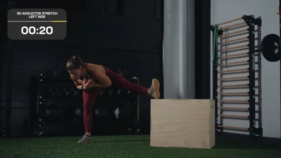 CrossFit and Pliability athlete Laura Horvath completing a 3D abductor stretch