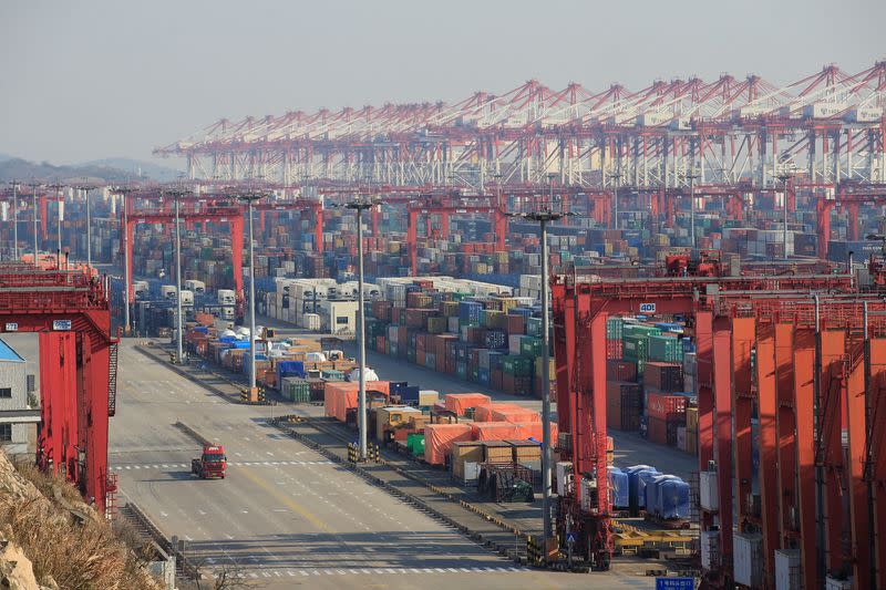 Containers are seen at the Yangshan Deep Water Port, part of the Shanghai Free Trade Zone, in Shanghai