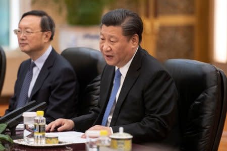 FILE PHOTO - China's President Xi Jinping speaks to France's Prime Minister Edouard Philippe (not pictured) during a meeting at the Great Hall of the People in Beijing, China June 25, 2018. Fred Dufour/Pool via REUTERS