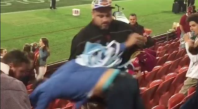 The night went from bad to worse for the young blues fan who was dragged over multiple rows by his rival fan. Source: Supplied