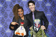 <p>Yvette Nicole Brown and Darren Criss attend the <em>Muppets </em><em>Haunted Mansion</em> premiere in L.A. on Oct. 7.</p>