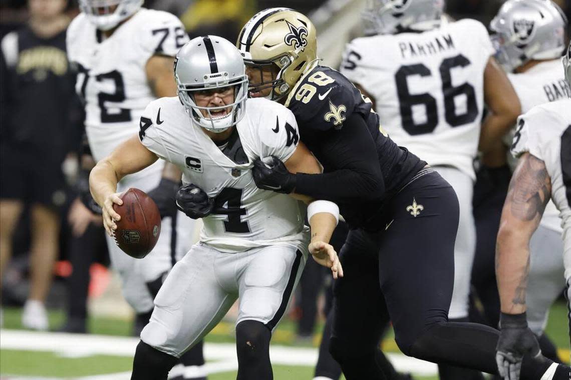 New Orleans Saints defensive end Payton Turner sacks Las Vegas Raiders quarterback Derek Carr during the second half of an NFL game Sunday, Oct. 30, 2022, in New Orleans.