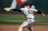 San Francisco Giants starting pitcher Logan Webb (62) delivers against the Oakland Athletics during the second inning of a baseball game, Sunday, Aug. 7, 2022, in Oakland, Calif. (AP Photo/D. Ross Cameron)