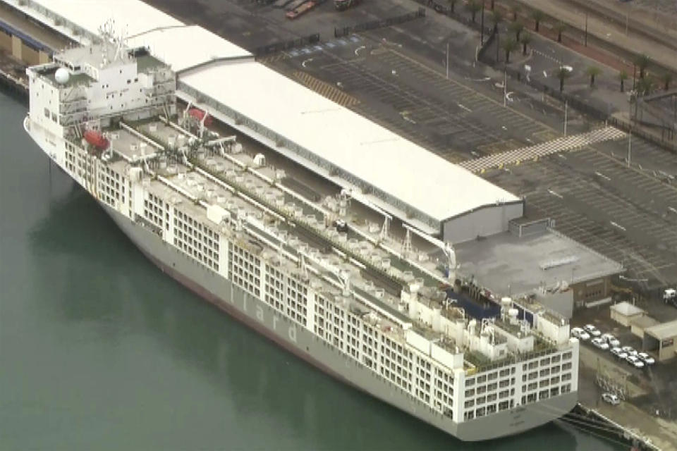 This image from a video shows a freight ship in Fremantle, Australia Tuesday, May 26, 2020. A coronavirus cluster was detected on Tuesday on the ship berthed in the Australian west coast port of Fremantle, raising questions about why local authorities weren’t alerted to the danger. (AuBC/CHANNEL 7/CHANNEL 9 via AP)