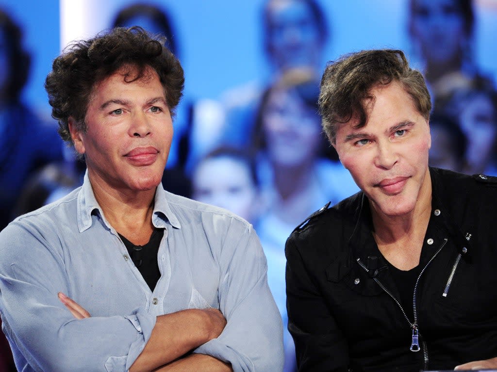 Igor and Grichka Bogdanoff on French television on 20 October 2010 in Paris, France (FRED DUFOUR/AFP via Getty Images)