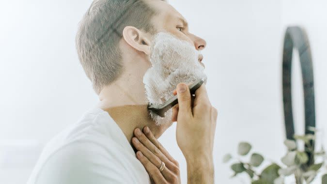 man shaving.