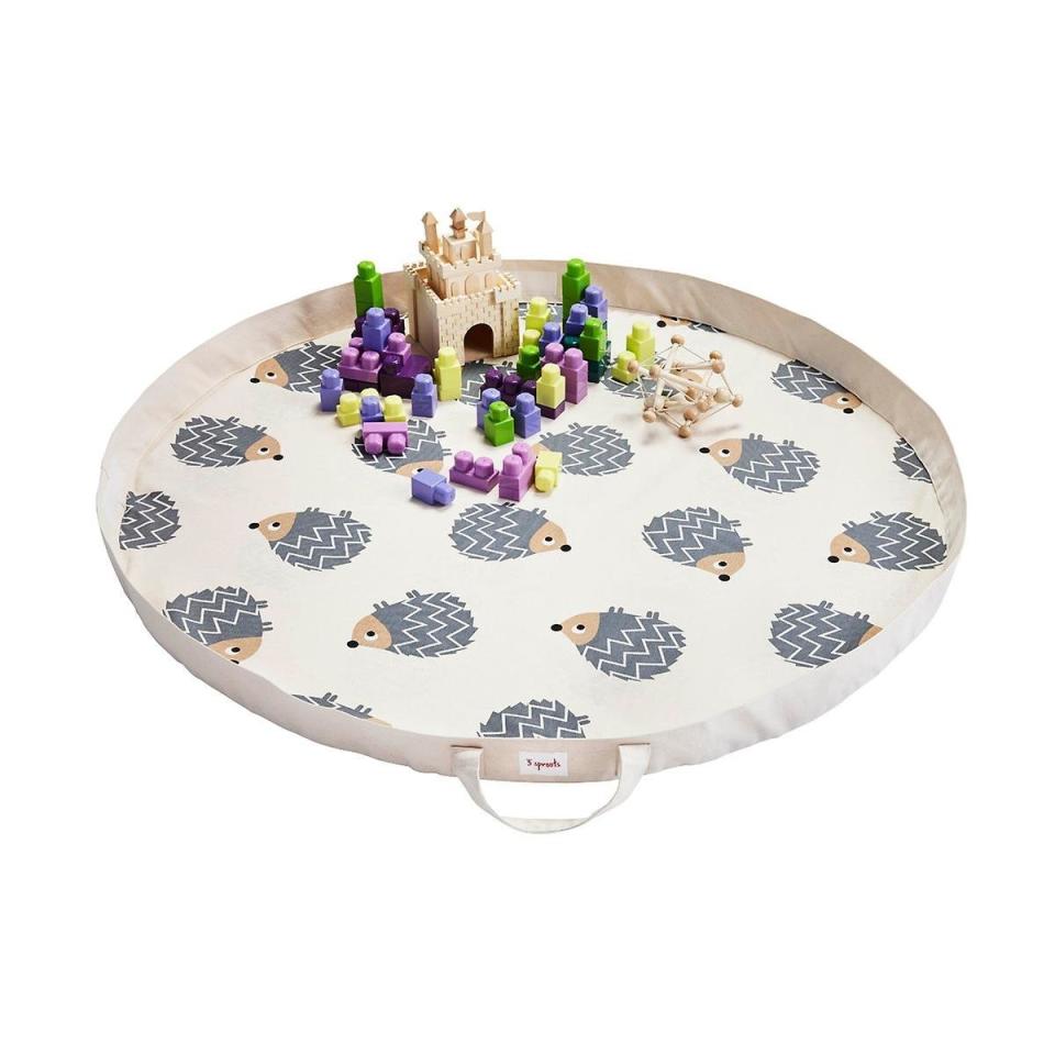 Get it <a href="https://www.containerstore.com/s/toy-storage/3-sprouts-hedgehog-play-mat-bag/1d?productId=11007472" target="_blank">here</a>.