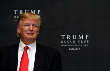 FILE PHOTO: U.S. property magnate Donald Trump smiles during the inauguration of the Trump Ocean Club in Panama City, Panama July 6, 2011. To match Special Report USA-TRUMP/PANAMA REUTERS/Alberto Lowe/File Photo