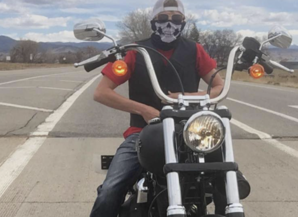 Michael Everett, 23, is pictured on a motorbike.