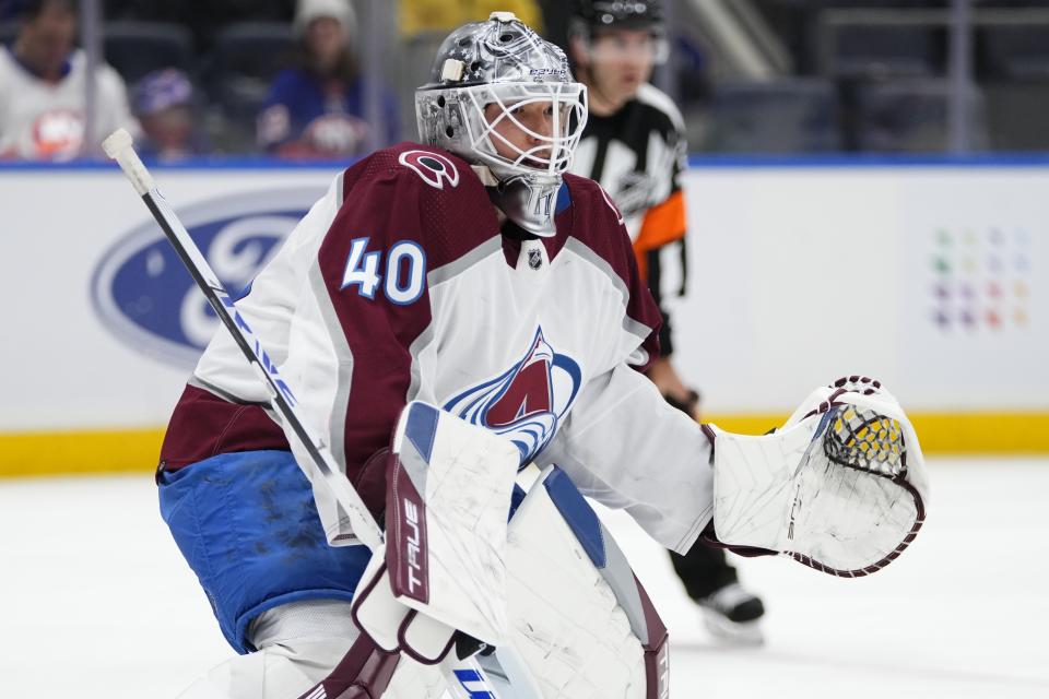 Colorado Avalanche goaltender Alexandar Georgiev watches play during the second period of the team's NHL hockey game against the New York Islanders on Tuesday, Oct. 24, 2023, in Elmont, N.Y. (AP Photo/Frank Franklin II)