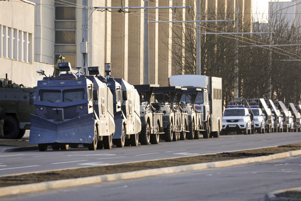 Police water cannons parked in a street to prevent a rally commemorating the founding of Belarus' 1918 proclamation of independence from Russia, in Minsk, Belarus, Thursday, March 25, 2021. Belarusian opposition have urged people to protest against repressions in the country and Lukashenko's regime. (BelaPan via AP)